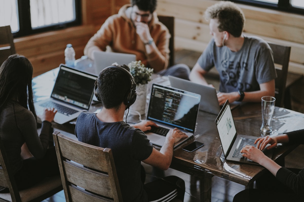 Small business team collaborating with technology